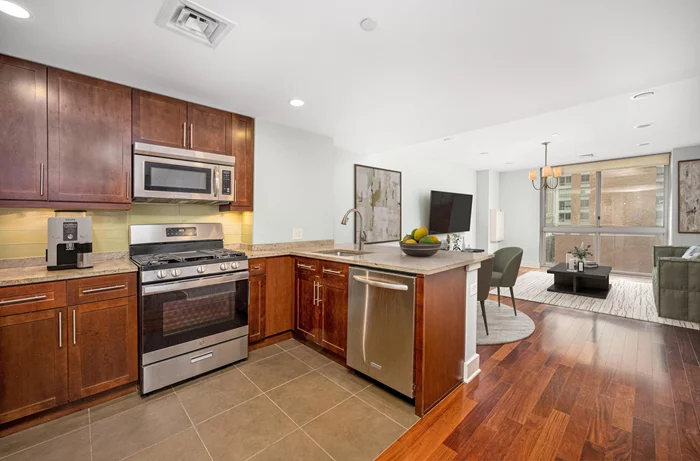 A spacious East-Facing 1 BR (with a walk in closet) featuring floor to ceiling windows in the heart of Downtown Jersey City. Looking South one can see the Statue of Liberty. In unit washer/dryer. Minutes walk to Whole Foods, Grove St Path station, the Ferry, and the bustling Newark Ave pedestrian plaza. Lightrail station directly outside the front of the building. This building has a 24 hour concierge, fitness center, community room, and BOWLING! It is time to upgrade your life. PARKING IS included in the rent. One month broker fee.