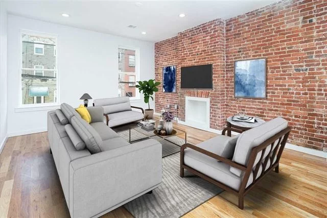 Fully renovated 3 bedroom apartment on prestigious Park Avenue. This gorgeous apartment features the perfect combination of modern amenities and old world charm. The open layout kitchen is complete with beautiful white cabinets, stainless steel appliances, quartz countertops and breakfast bar. You will love the exposed brick, beautiful hardwood floors, recessed lighting and in-unit washer/dryer. Residents of 512 Park are sure to enjoy the common courtyard on a nice day. Located just half a block from Church Square Park and dog park. Convenient to Washington Street's terrific restaurants and shops, parking and the beautiful Hoboken Waterfront. Many transportation options, including the PATH, Ferry and Bus to NYC as well as NJ Transit Trains and Light Rail. Additional storage space in the basement included for the first year! Pets considered. Available June 1st!