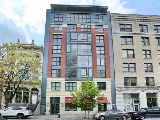 Spacious 7th floor apartment in an elevator building in the heart of Downtown JC/ Paulus Hook area. Walking distance to Grove and Exchange PATH stations for easy commute to the city also to the Ferry, shopping and dining areas. This one bed plus den with two full baths at 1, 047 sq feet is as good as a two bed, has large closet space. The building was built in 2010. Washer dryer in the unit. Parking though a block away is included.