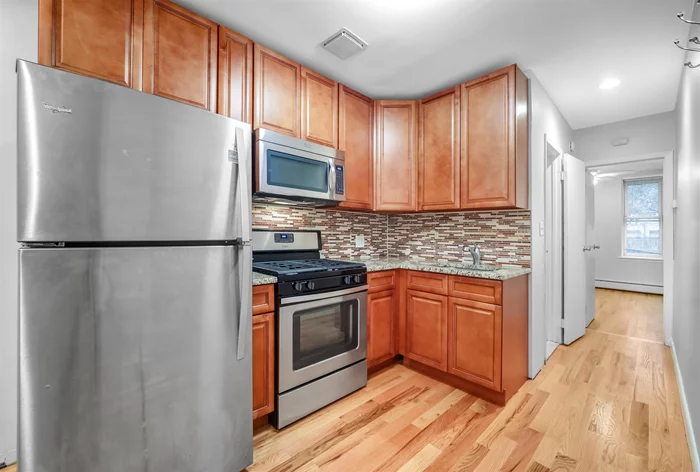 Centrally located, beautifully updated 1 bed, 1 bath, first floor unit! Enter into the kitchen & living room with a hallway leading to the bathroom and bedroom in the back. Hardwood floors throughout. There is a spacious shared patio in the back. Come enjoy the fabulous lifestyle in Hoboken, New Jersey!
