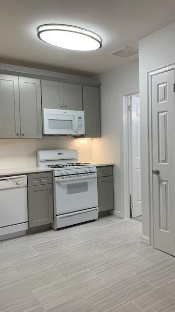 Location, Location, modern, all renovated 1BR, 1Bath Condo, close to NYC, in the heart of downtown historic Jersey City. Just a few minutes walk to Grove St Path, convenient to many restaurants, parks & NYC ferry/transportation. Well maintained Elevator Building with laundry room and a shared rooftop deck, just completed all renovated kitchen, all new cabinets and quartz counter tops, has dishwasher, microwave, gas oven range, refrigerator, an open concept layout to a spacious living room - beautiful hardwood floors throughout, central air, high ceilings, large bedroom, plenty of closets including a pantry - sunny and bright. Building has an exercise room that is optional, there is a fee of $10.-/mo per person There is a gated parking lot in back of building, if a spot is avail., extra fee $250.-/mo available now, May 1st, for immediate move in - 1mo broker fee paid by the tenant, security deposit 1.5mo