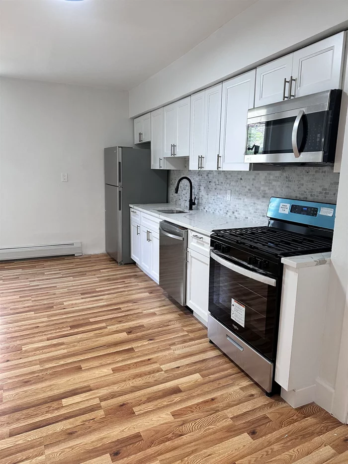 Newly renovated 3 bedroom unit in the SOHO section of downtown Jersey City that is flooded with tons of natural light. All appliances & windows are new! Tenant responsible for their own utilities. See floor plan with details on unit and room sizes. Application/credit check required. No pets. Text to see a video of the unit!