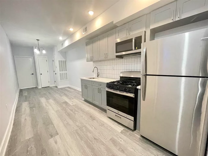 2 bed 1 bath in JC Heights!  Spacious apartment with an open living room/kitchen concept. Central Ac/heat. Microwave, refrigerator & gas range stove provided only. Video intercom to see who's at your front door. Street parking ONLY. No Laundry