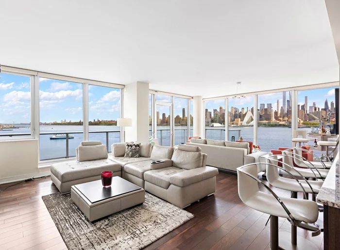 The crown jewel of this highly sought after waterfront luxury building. The most impressive river and Manhattan skyline views from this top floor, open floorplan, 1927 sq ft corner home with a sun-drenched wrap around terrace. This spacious and upgraded 3 bedroom, 3 bathroom is incomparable to other available homes with hardwood floors throughout and new W/D. Available furnished or unfurnished and includes 2 garage parking spots! Amenities include full service 24 hour concierge, 2 hotel guest suites, event room, skyroof w/ NYC views, business center, sauna, state of the art fitness center. Outdoor pool located at building 1200 Ave at Port Imperial, available for seasonal fee. Stroll along the waterfront to restaurants, shops, dog park, playgrounds! Whole Foods nearby! Steps from New York Waterway Ferry w/service to W. 39th St. Manhattan, in 8 minutes. Routes to Pier 11 at Wall St. & Brookfield Place Terminal. Due at lease signing: 1st Month Rent, 1.5-Month Security, 1-Month Broker Fee. Pets permitted on a case by case basis.