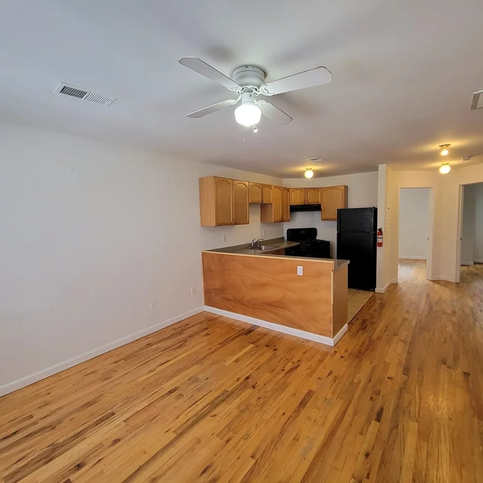 Spacious & bright 2 bedroom freshly painted and newly finished wood floor. Ready to rent!! Call today!!