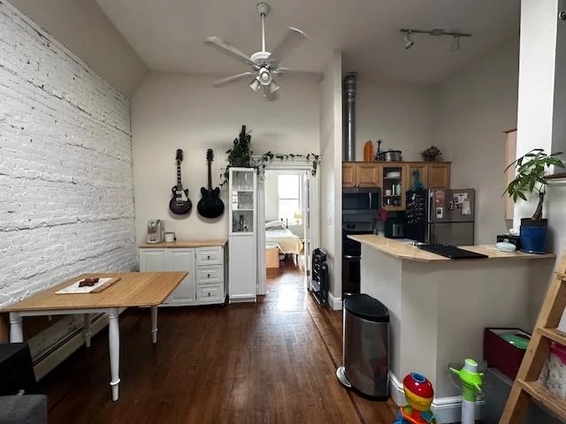 This bright and sunny 2 bedroom one bath unit with 12 foot ceilings has two skylights & includes a bonus loft . Washer/dryer in the unit, hardwood floors and white washed exposed brick with bedrooms on opposite sides. The open kitchen is great for entertaining. Convenient downtown location, close to Path Train, bus to NYC, shops, restaurants and parks.