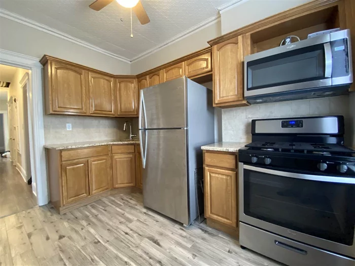 Newly renovated 3BR + Office/Den in JSQ! Spacious 2nd floor unit on a quiet dead-end street featuring new kitchen with stainless appliances, beautiful new floors, and gorgeous new bathroom. Free laundry in building, storage available in basement, and a shared backyard. Walking distance to the path... Available 8/1!