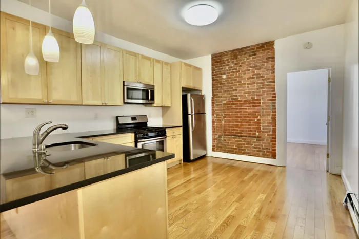 Beautifully renovated 2 bedroom in the heart of Jersey City Heights. This home features stainless steel appliances, updated bathroom, central heating/ cooling system and an excellent open layout with exposed brick. Perfectly positioned between Central and Palisade offering a close walk to Washington Square and Riverview Park. Prime neighborhood with easy access to shopping, parks, schools, cafes, restaurants and NYC transportation! Available ASAP.