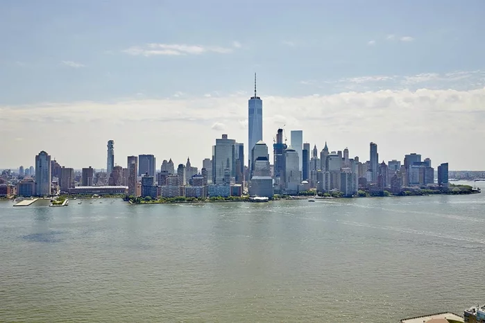 Welcome to this oversized one-bedroom, one and a half bath unit with jaw-dropping views directly on the waterfront! Enjoy NYC & River views through a wall of floor-to-ceiling windows. This unit features a super sleek and modern kitchen and modern bathroom finishes in both the main bathroom and the powder room. Gleaming hardwood floors throughout the home as well as laundry in unit. One complimentary valet parking space is included. Light Rail, PATH & ferry are all in close proximity. This ultra-luxury building features a 24-hr concierge, outdoor pool, sauna, fitness room, screening room, conference room, kids play area and much more!