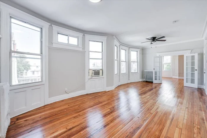 Enjoy this 1, 550 sq ft 3BR plus den apartment with private, enclosed porch featuring views of The Statue of Liberty AND shared backyard! Shining with natural light throughout, this newly renovated home is simply gorgeous. Washer/dryer in unit, dishwasher, and conveniently located on the second floor of a 3-family home, this unit is perfect for anyone in need of a spacious, open layout. Just a few blocks from Garfield Ave Light Rail, and Berry Lane Park. Enjoy local favorites such as 902 Brewing Co., Light Rail Cafe, and more! Pets conditional. Broker fee applies. Credit and background check required.