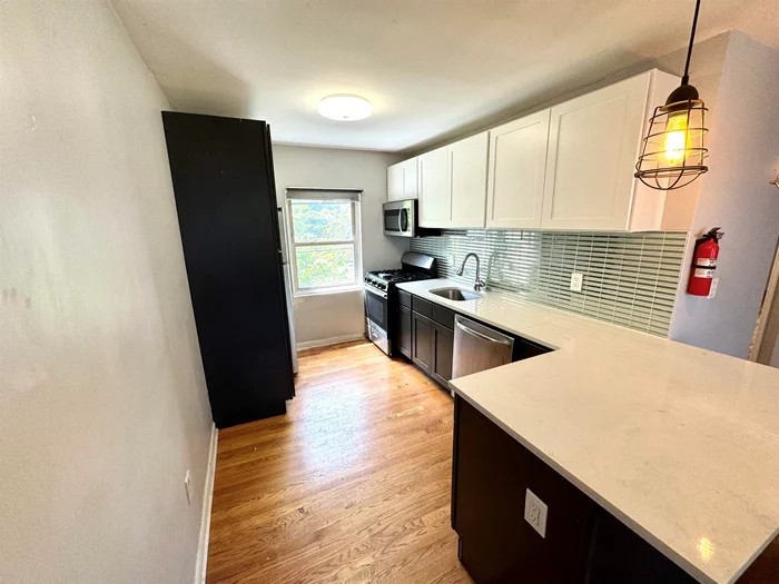 1 bed 1 bath with a PARKING SPOT INCLUDED IN JERSEY CITY WB This large updated apartment features stainless steel appliances, large living room, 1 bedroom and 1 bathroom. Washer and dryer in building and 1 parking spot included. Close to transportation and stores! Inquire today