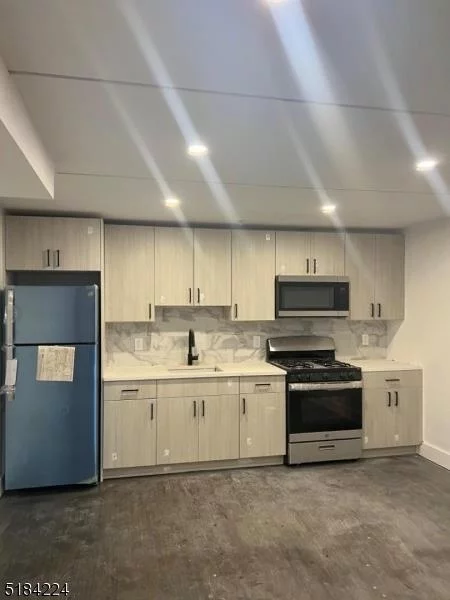 NEWARK IRONBOUND! This modern large apartment boasts of so much things to offer. 2 bedrooms, large kitchen/living room area open concept, central A.C/Heat and more. Walking distance to multiple transportation, shopping and restaurants! Inquire today!