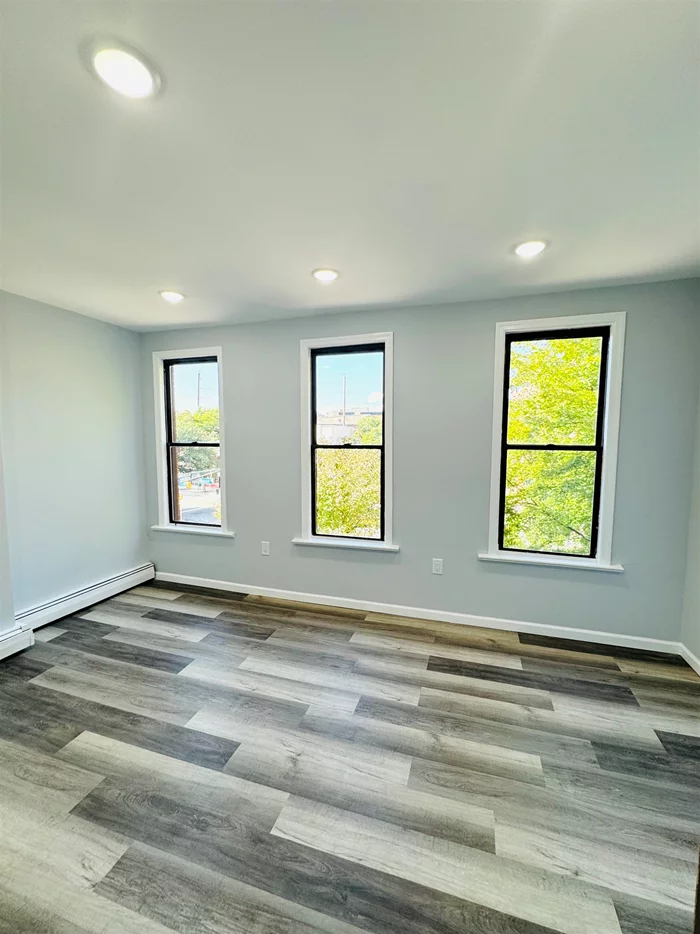 This newly renovated and freshly painted 1 bedroom, 1 bathroom apartment is located 2 blocks from the Grove St. PATH station in Downtown Jersey City. Updates include a brand-new bathroom, new kitchen cabinets & countertop, and laminated wood flooring throughout the apartment. The apartment is located on the 3rd floor of a walk-up building. No laundry on site. Laundromat is 2 blocks away. 1.5 month security deposit. No pets allowed. Available now. The tenant pays for electricity, heat and gas.