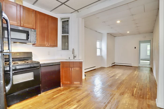 AVAIL ASAP -- Two Bedroom apartment in prime location of Jersey City Heights. The unit features hardwood floors, newly renovated kitchen with plenty of cabinet space, with new dishwasher and new microwave. One floor walk up. Very conveniently located to all mass transit, shopping, nightlife, schools, parks, and more!