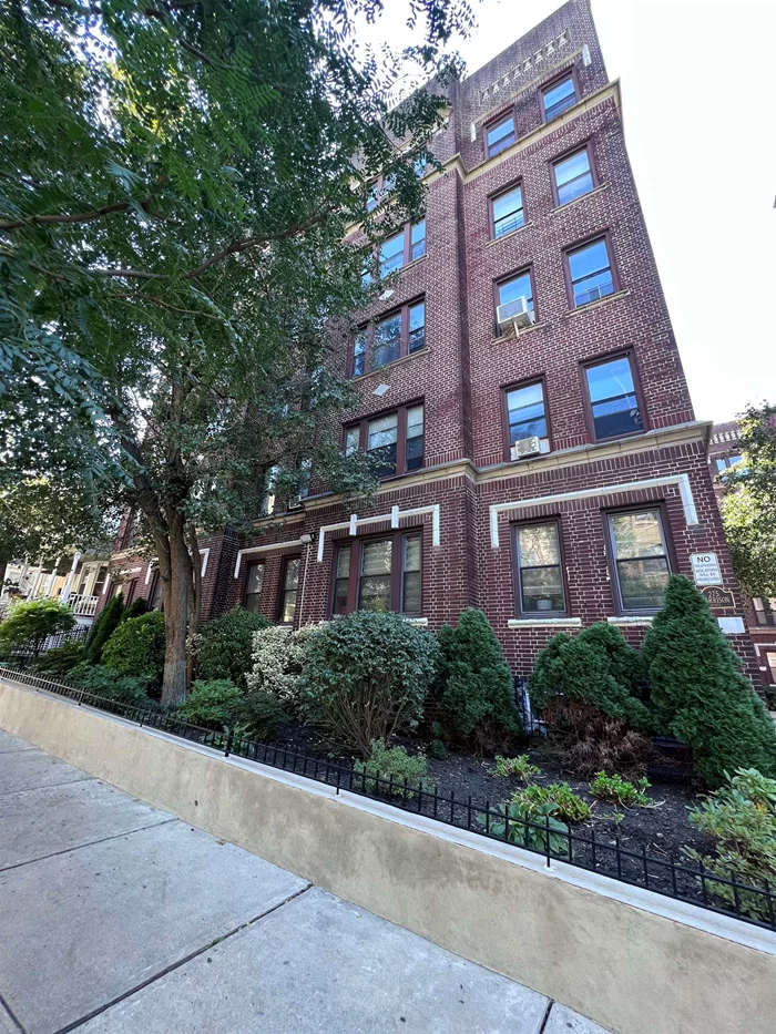 Welcome to the revered Journal Square section of Jersey City NJ. This spacious 2 BR 1 BA residence located on the fifth floor of this stunning pre-war building features parquet floors throughout with 2 spacious bedrooms overflowing with natural sunlight. The bathroom features marble floors, marble tile shower w/Glass doors and crown molding accents that are sure to please. The galley kitchen features marble counters and a porcelain farmer's sink offering both function and aesthetics. Elevator building with Washer/Dryer room located on the ground level of the building. Super-intendant also lives on the premises. Located down the street from the gorgeous Lincoln Park! Enjoy your own slice of city living on a quiet block with everything at your fingertips.