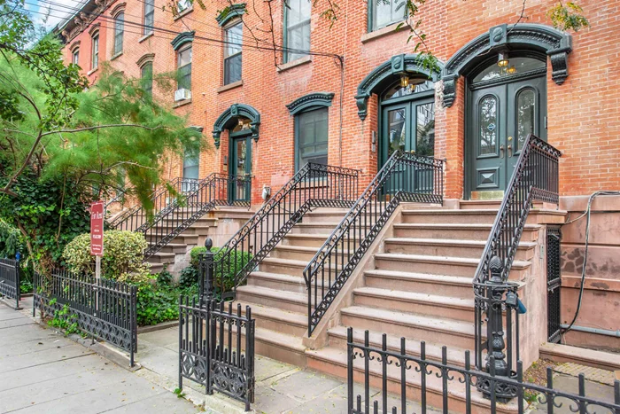 This bright and modern one-bedroom apartment, set on a picturesque, tree-lined street in a charming brownstone in the historic Paulus Hook neighborhood of Downtown Jersey City, effortlessly blends charm and convenience. Recently renovated, the apartment features a living area with a south-facing orientation and an open floor plan, complete with an ornamental fireplace. The spacious bedroom offers comfort with wall air conditioning and ample storage space. Just miles from Manhattan, this apartment is ideal for commuters, with a quick four-block walk to a ferry that reaches Manhattan's financial district in just seven minutes. The highly sought-after area offers excellent access to Manhattan via the Exchange Place and Grove Street PATH stations, the Paulus Hook ferry, and the Light Rail, all within a 10-minute journey. A stroll down Warren Street offers a captivating view of the Statue of Liberty, adding a touch of grandeur to everyday life. To top it off, the property includes a private backyard space, perfect for outdoor relaxation. Additionally, a DEPOSIT-FREE option for qualified tenants makes the move-in process smoother and more accessible.