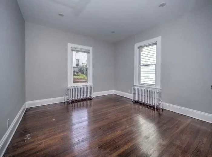 Location! Location! LOcation! Spacious 2 bedroom apartment with a backyard for rent in popular Jersey City Heights! Kitchen with stainless steel appliances, Spacious rooms and hardwood floors. Lots of natural sunlight. Close to School, Parks, Cafes, shopping and much more!! Easy Commute to NYC.