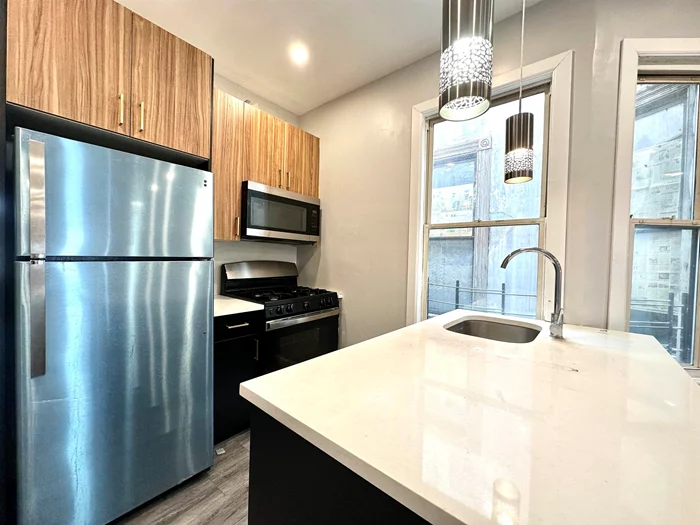 2 Bed 1 Bath in the Jersey City JSQ near Hilltop! This beautiful apartment features appliances, with a deep sink, gas stove and refrigerator. Only a few blocks away from the train and buses. Schedule your tour today! Pets upon approval.  High Ceilings Hardwood Floors Intercom Natural Light in Living Area Eat In Kitchen Stainless Steel Appliances