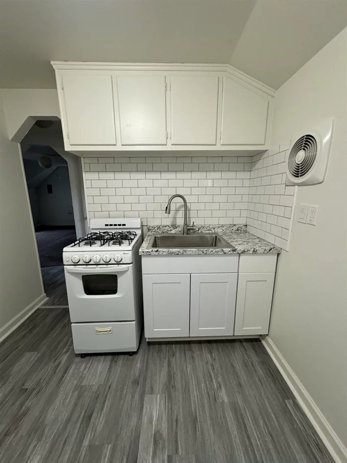 Cozy 1 bdrm / 1 bath apartment on the second floor of a two family home. This unit is available now and includes heat, electric, hot water and water. No pets and no parking. Rental requires credit check and verification.