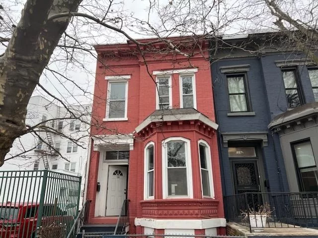 Welcome to this single family brick row house located in historic Bergen- Lafayette neighborhood of Jersey City. 3 bedrooms and 1.5 baths home with own private backyard perfect for BBQ. Features new floors, new deck, new stove and new refrigerator, 4 decorative mantles, beautiful original plaster moldings and W/D and storage in basement. Near Hudson-Bergen light rail station, schools, shopping and parks.