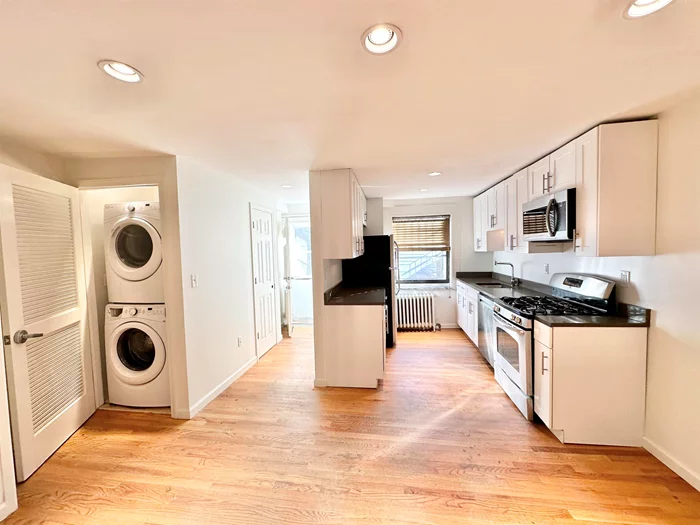 This beautiful brownstone duplex unit is conveniently located in the Van Vorst Park section of Downtown Jersey City. Everything is accessible to this home; Restaurants, bars, coffee shops, nail salons, day cares, public parks, and public transportation. All while nestled on a quiet tree lined one way street on historic Mercer Street. This unit is only a 5/8 minute walk to Grove St. PATH station. This unit boasts a large 2bed/1.5 bath Duplex with hardwood Floors throughout the entire unit, exposed brick, washer dryer in unit, dishwasher, separate dining space, separate living room, exclusive backyard, and basement storage! Approx. 1, 200 Square feet (excluding basement & backyard!) Treat yourself to the square footage, location, finishes, and all the upgrades one would like with private outdoor space! This unit will not last! Call today!