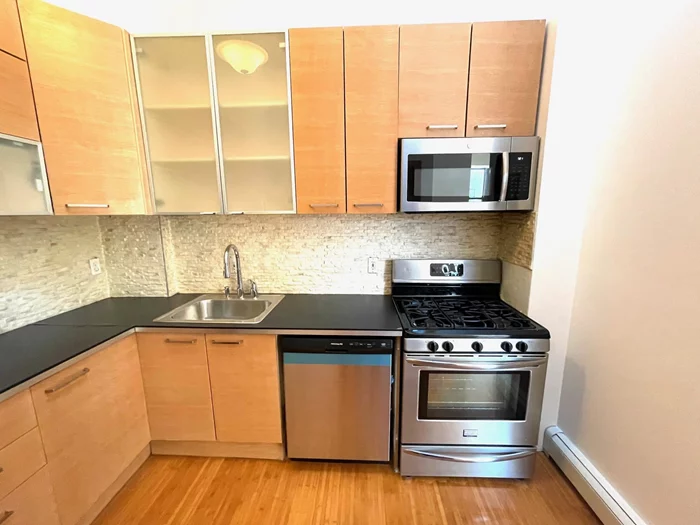 Beautifully renovated 1 bedroom apartment for rent in luxury elevator building. Located in the heart of Jersey City Heights on Central Ave. The apartment features high ceilings, custom cabinetry, a modern sleek bathroom, nice tiles and hardwood floors throughout. Laundry facilities and storage available on premises for an additional fee. Around the corner from Bus stops or close to the 9th street light rail elevator. Move-in ASAP!