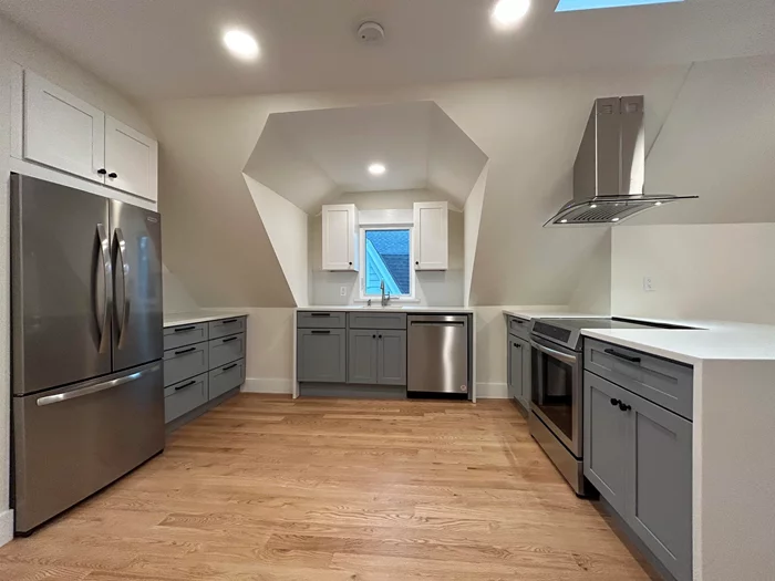 Beautifully renovated 1BD/ 1BA on a tree lined street in the desirable Kings Bluff section of Weehawken. Highlights include an abundance of natural light, NYC view, open floor plan, central AC and hardwood floors throughout. The spacious chef's kitchen boasts stainless steel appliances, 2 tone cabinetry and lots of storage. In addition there is a stylish bathroom and ample closet space. Free laundry is included in the basement. Steps away from NYC transportation. Street parking is easily available out your front door. Nearby parks and shopping.