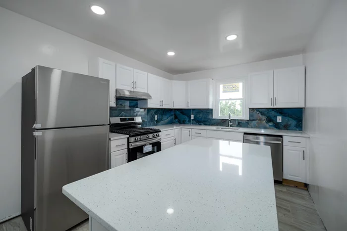 JUST RENOAVTED -New kitchen, All New APPLIANCES, New flooring, New painting, New lighting. EXCLUSIVE DRIVEWAY -Ready NOW, waiting for you to turn it into your own home!