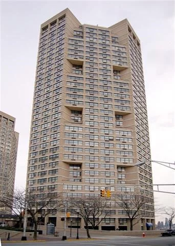 AVAILABLE FEBRUARY 15TH- Spacious 1 Bedroom 11/2 Bath 1069 sq ft Condo located in a Luxury Hi Rise full ammenity building THE GALAXY TOWERS. Corner unit with harwood floors and an upgraded kitchen with stainless steel appliances. Extra room can be converted to an office or cozy small bedroom Partial vew of Manhattan. Amenities include 24 hour concierge, indoor outdoor pool, spa, gym, sauna, conference rooms and tennis courts. All utilities included in rent except Internet, phone and parking. Parking available for $120/car monthly. Public transportation in front of building. Easy commute to Manhattan. Mall in building has Grocery store, Restaurants and more.