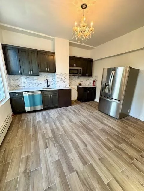 Beautiful renovated 2 bed/1 bath apartment in Jersey City Heights. Tenant pays all utilities. 1 car parking available for extra fee in the driveway. Shopping & restaurants nearby.