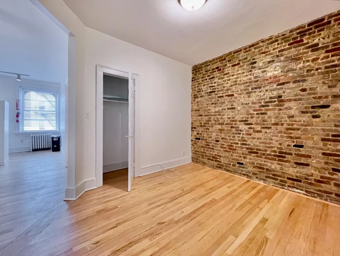 This two bedroom apartment is just a few blocks from the Grove St PATH as well as all of the restaurants and bars in the vibrant Downtown Jersey City neighborhood. Two spacious bedrooms, brick wall in the living room, separate dining area, and kitchen with stainless steel appliances including a dishwasher. Recently refinished hardwood floors throughout. Laundry in the building. Available ASAP - Ask to see the virtual tour!