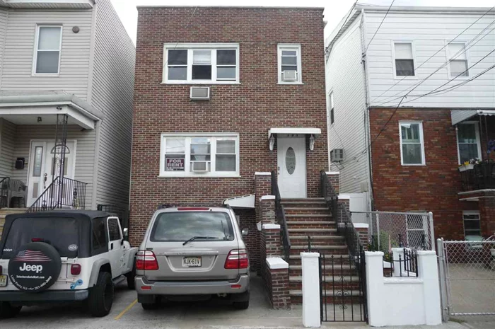 2-bedroom PLUS DEN - 1 bath - eat-in kitchen - window A/C's - Fantastic location 2-1/2 blocks from 9th St/Congress light rail station - 1 parking spot included - Common Back Yard - free washer/dryer in basement