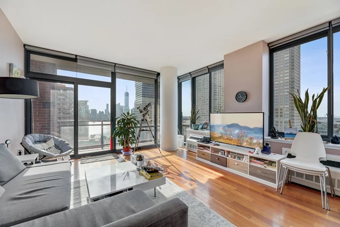 Available on 1/15/2025. Pet friendly. One garage parking, water, hot water, and cooking gas all included in the rent. A rare opportunity to live in a K-line corner 2BR/2BA unit at the highly sought-after 389 Washington. This sun- drenched home features South & East exposures, breathtaking NYC and river views from your private massive terrace, multiple floor-to-ceiling windows taking in abundant natural light, and a remarkable floor plan with 1247 Sq Ft of living and storage space. The kitchen is equipped with top-of-the-line appliances and a dining island with four sittings. The master bedroom offers a huge walk-in closet and an en-suite bathroom with both shower and bathtub and double sinks. A Condominiums is a full-service building offering 24-hr concierge, fabulous outdoor terrace, gym, newly renovated residents lounge & kids room, and play area. This superb location is conveniently located one block fromPage 2 of 3 ShopRite & BJ's, and blocks from shopping and dining. Whole Foods is just two blocks away. Ferry to NYC, Newport, Exchange Place & Grove Path stations, and light rail Station are at doorstep. No smoking. Non-refundable pet fee may apply. Walk-through video is available on YouTube.com for a unit with the same layout and on a similar floor -- please search with the address and the unit number.