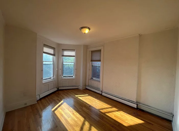 Welcome to your dream apartment in the highly desirable Hamilton Park neighborhood of Downtown Jersey City. This spacious 1 Bedroom / 1 Bath unit offers 875 square feet of luxurious living space with stunning hardwood floors throughout. Natural light pours in through the large windows, creating a warm and inviting atmosphere. With ample closet space, you'll have no trouble finding a place for all of your belongings. The well-designed layout of this apartment allows for versatile use of the den, making it the perfect space for a home office, guest room, or additional living area. Conveniently located near Hamilton Park, you'll have access to the park's lush greenery, playgrounds, and recreational facilities right at your doorstep. And for those looking to commute to New York City or other parts of Jersey City, the sought-after Grove Street Path Station is just a short walk away. Don't miss your chance to experience the perfect blend of location, space, and natural light in this charming unit. Schedule a showing today and discover all of the endless possibilities this apartment has to offer. Don't wait, this opportunity won't last long. Inquire now and make this dream apartment your new home.