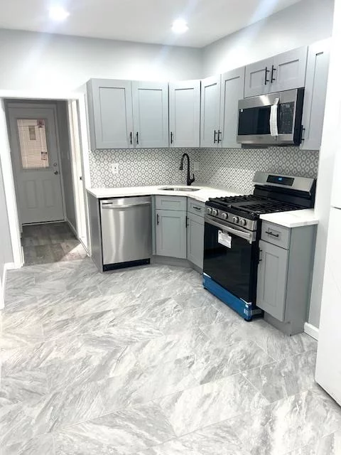 Newly Renovated 2 Bed 1 Bath single family house in the Jersey City . This apartment features large kitchen with an over the range microwave, gas stove, and refrigerator. Washer and dryer insie the basement. Private backyard. Garage parking available for extra $150 per month. Only a few blocks away from the train and buses. Schedule your tour today! Pets upon approval.