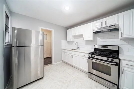 Gorgeous fully renovated one bedroom in bustling Bergen Lafayette. Freshly painted and completely gutted one bedroom home close to Light Rail and Bus. Unit is about 600 square feet. All stainless steel appliances and beautiful countertops. Grays and white very modern palette. This won't last.