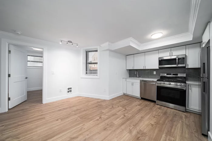 Location location location! Be the first to live in this fully renovated garden level apartment with all new fixtures and appliances! 151 Sip Avenue is nestled in the historic and rapidly redeveloping area of Journal Square and McGinley Square in Jersey City! A commuter's dream, you will be less than a 10 minute walk to Journal Square PATH which connects you to anywhere you need to go. Outside your door, you'll be in the hub of multicultural cafes, restaurants and shopping. The best of what Jersey City has to offer! These large apartments are perfect for young professionals and families alike. The building has laundry on site, an elevator,  a super onsite, and is pet friendly! Schedule your tour today!