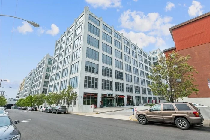 WELCOME HOME. Luxury living on the PENTHOUSE floor in Canco Lofts. 27ft Ceilings and 11ft windows in this restored warehouse conversion. Unique Loft with a TRUE Primary Suite on the Main Floor. Modern styled loft renovation featuring an upgraded Eat in Kitchen with Cafe Appliances. Walk into a double story EIK with space for your Dining table leading into your Living Room. Off the LR is a true Primary Suite with a WIC and Ensuite Bath. The 2nd story offers a Bedroom with an Oversized Skylight and Huge WIC. Over 10, 000 sqft of amenity space ranging from a fully equipped Fitness Center, Yoga area, Basketball court, Outdoor residents area, Media Room, Grill, Dog wash, Lounge/Party Room & more. Come see Luxury living minutes from Journal Square. Advertised rent for an 18 month lease.