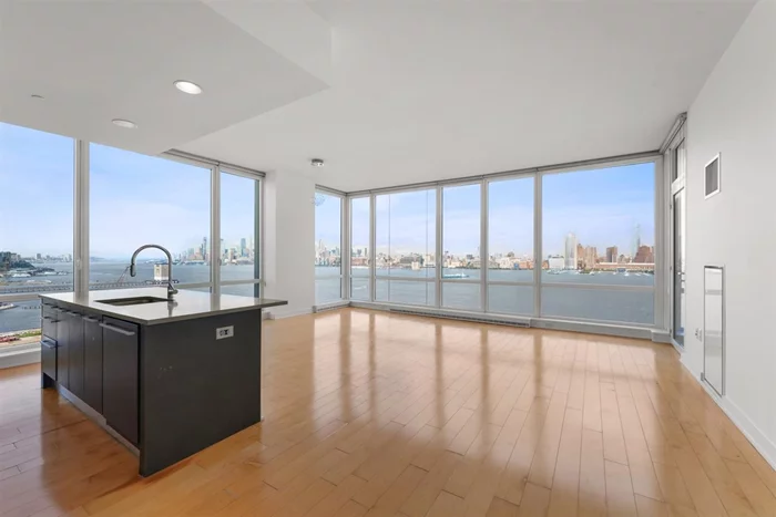 Fabulous 3BR/2.5BA in Crystal Point, one of Jersey City's most desirable buildings. Unit features an outdoor terrace, high ceilings, and floor to ceiling windows, leaving you with panoramic NYC views from GW to Verrazano bridge. This 1, 591 sq. ft. unit boasts hardwood floors throughout, kitchen with Jenn Air appliances, Pedini cabinets, Custom Closets, Quartzite counter tops, and elegant marble bathrooms. Crystal Point offers state of the art amenities such as a 24 hour doorman, fitness centre, crystal spa, play room, residents' lounge, screening room and much more. One valet parking spot included. Blocks away from Newport and Exchange Place PATH, making it perfect for the NYC commuter.** This floor has higher ceilings than other floors.