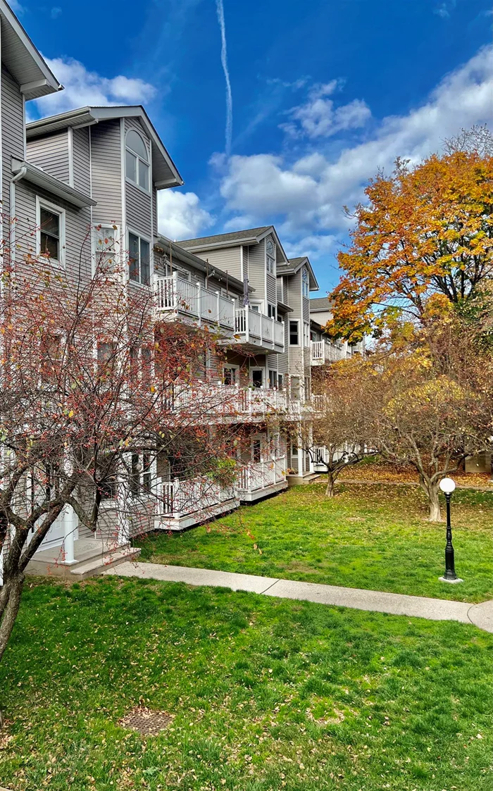 Welcome home to a stunning 2-bedroom, 2 full-bath unit with an expansive upstairs loft overlooking a bright and airy living space. Enjoy the convenience of an in-unit washer/dryer, a spacious Private Balcony for relaxation, and access to a shared community backyard. Impressive 18-foot ceilings, this home is flooded with natural light and features ample closet & storage space. 1-Car Garage Parking Space included. Situated just one block from Kennedy Boulevard, with easy access to bus transportation as well as the 48th Street Light Rail, commuting to and from NYC/NJ is a breeze. Close to parks, shopping, and places of worship, this gem offers a suburban feel in the heart of a vibrant urban city life. Schedule tour today!