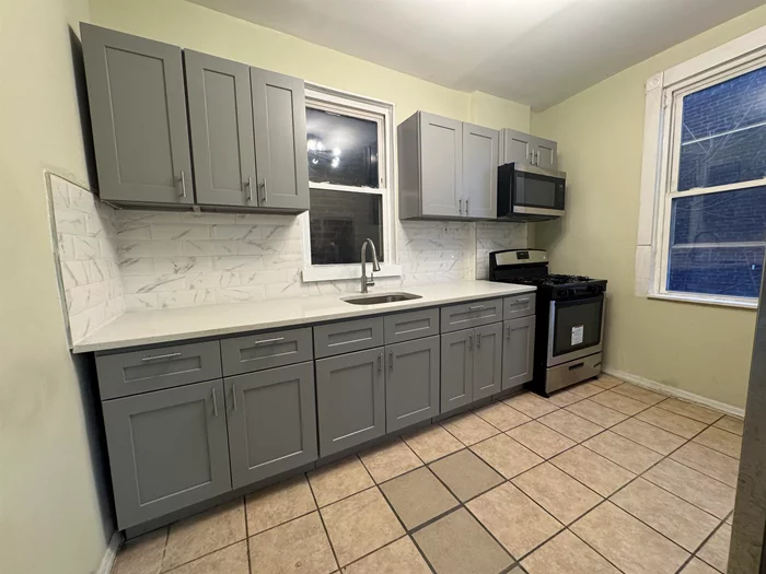 Welcome to this conveniently located three bedroom unit in booming Bergen Lafayette! This is the perfect apartment for anyone looking to save up for future investments. Located just a 10 minute walk from the Garfield Light Rail Station and Berry Lane Park, as well as a short drive to Liberty State Park.