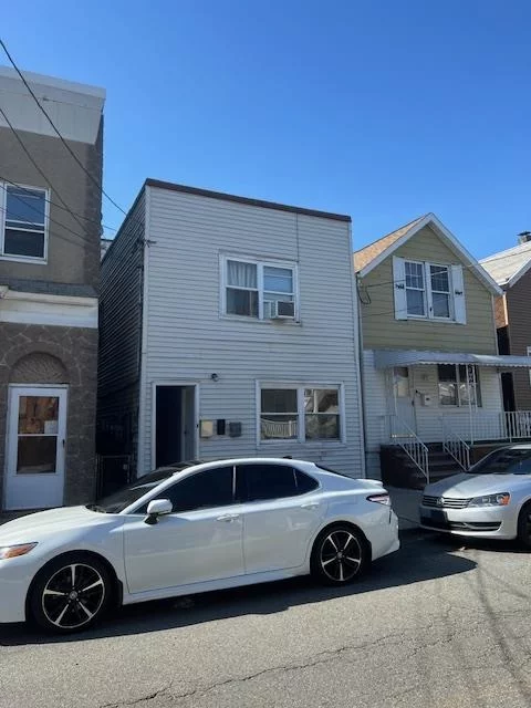 Bayonne 2 bedroom 1 bath apartment. Huge living room, open kitchen, all hardwood floors. First floor apartment. Spacious bedrooms and easy access to NYC transportation. Common Backyard.