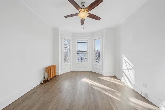 Welcome to a freshly painted, 3rd floor three-bedroom apartment conveniently located, to all major Public Transportation with an easy commute to NYC. Access to the back yard and washer and dryer coin operated located in the basement.