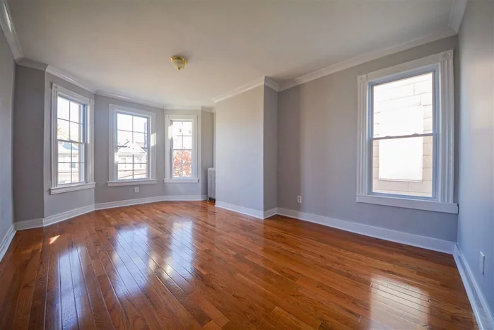 Newly renovated 3 bedroom, 1 bathroom apartment, beautiful hardwood floors throughout and a spacious new kitchen with custom cabinets, large countertop space. Bright and beautiful apartment with lots of natural light throughout, bay window in the living room. Close to NJCU University, transportation, shopping, restaurants, and parks.