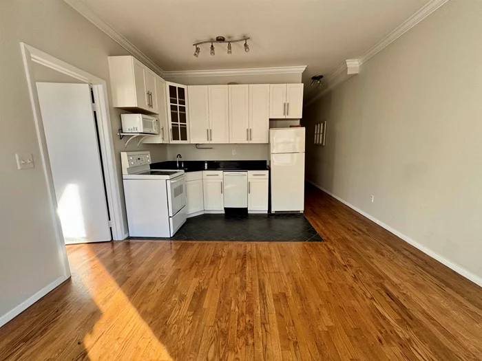 *** OPEN HOUSE 1/11 between 12-2 pm *** Prime location at 1st & Willow, just minutes from the PATH and steps to cafes and boutiques! This bright, sunny 1-bedroom, 1-bath corner apartment that features an open layout, high ceilings, large windows, hardwood floors, granite countertops, a walk-in closet, dishwasher, microwave, and ceiling fans. Enjoy low utilities in a professionally managed, clean, and well-maintained building with laundry conveniently located off the lobby.