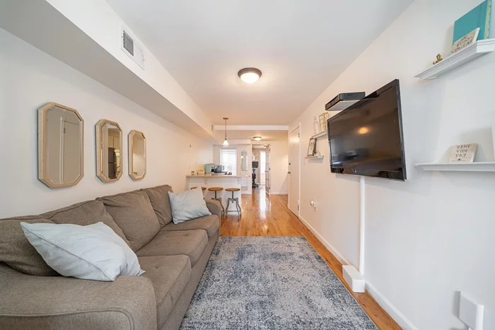 Welcome home to this stylishly renovated 1 bedroom + den in the heart of Hoboken! Smartly upgraded to utilize all available space, this bright home features hardwood floors, custom lighting, updated kitchen with stainless steel appliances, central a/c, generous closet space, modern bathroom, den/home office. The building offers additional storage in the basement as well as a shared yard. Located on 4th and Adams, you'll find easy access to shopping, dining, nightlife, NYC transit and so much more!