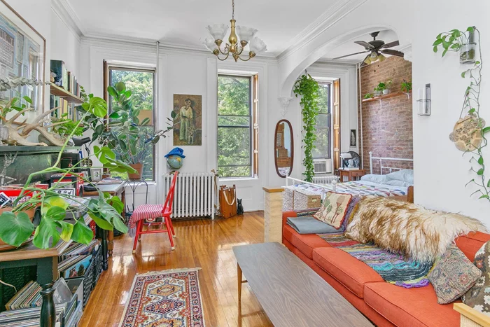 This charming and sun-drenched home is located directly on Van Vorst Park, in the heart of Downtown Jersey City, just 3 blocks from the Grove Path station. This spectacular brownstone apartment with picturesque park views exemplifies the poetic free spirit and elegance of a classic Victorian Brownstone, coupled with modern sophistication, all while reflecting the charm of the neighborhood itself. This home offers endless natural light from through the kitchen and living room where the soaring high ceilings with periodic crown moldings and colossal windows provide an unmatched level of rarity. Completing this ideal home is a Washer & Dryer. Come see this rare home while it lasts!