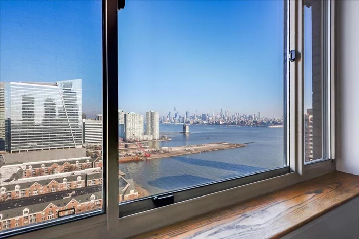 Gorgeous sun-filled 1bed-1bath unit on one of the top floors in the waterfront Portofino Condominium with amazing views of NYC. Bay windows & gleaming HW floors in living/dining room. Open kitchen with stainless steel appliances, W/D in unit, and parking available for rent! Full-service building with 24-hour concierge/doorman, fitness center, swimming pool, business center and children's playroom. Direct Midtown Manhattan view as well as Hudson River. Steps from Newport and Exchange Place PATH train stations and Hudson-Bergen light rail.