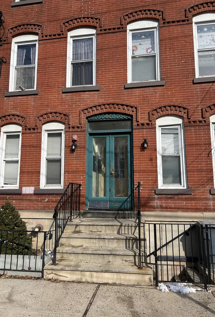 LOVELY FIRST FLOOR UNIT WITH 3 BEDROOMS 1 BATH IN THE HEART OF DOWNTOWN. HARDWOOD FLOORS CLOSE TO ALMOST ANYTHING AND EVERYTHING. WALKING DISTANCE TO PATH TRAIN STATION SCHOOLS HOSPITAL SHOPPING CTR. NO PETS ALLOWED. TENANT TO PROVIDE OWN WASHER AND DRYER. HOOK UPS READY.