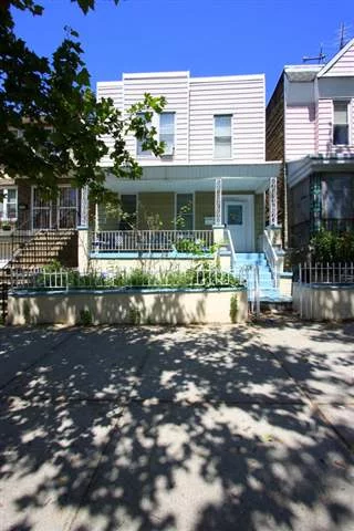 One family home in Jersey City Heights with porch and fenced backyard. Close to shopping, park, transportation.